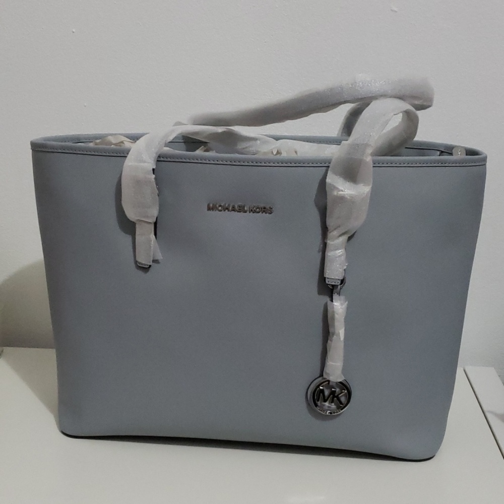 Jet Set Travel Medium Top Zip Multifunction Tote
